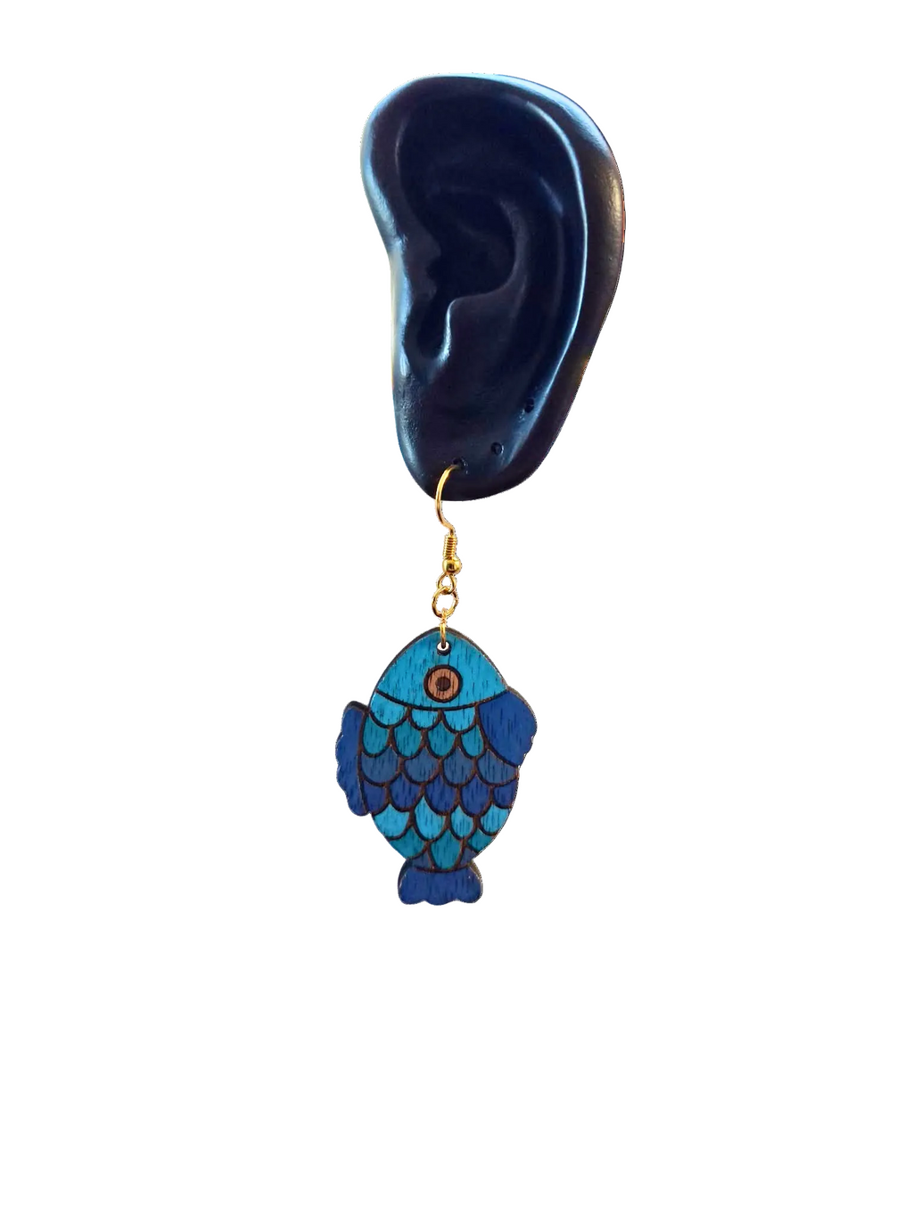 Blue fish-shaped earring on a white background