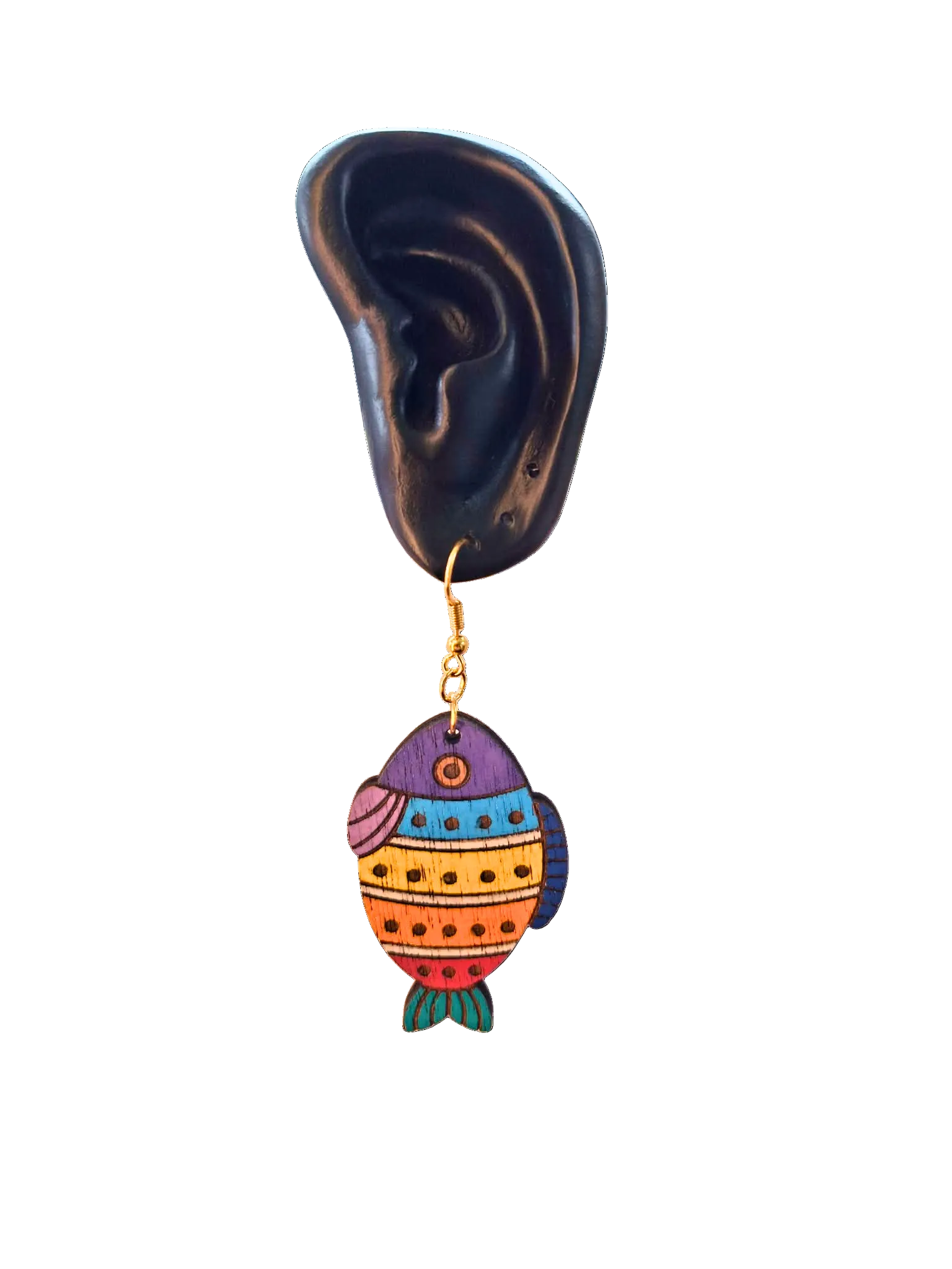 Colorful fish-shaped earring on a black ear model with a white background