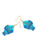 Blue fish-shaped earrings on a white background